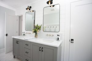 Like many older homes, this house had no primary bathroom. This one was created using the space of a small adjacent bedroom.