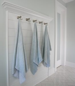 It is so easy to hang things on hooks. You'll never find a wet towel on the floor in this bathroom!